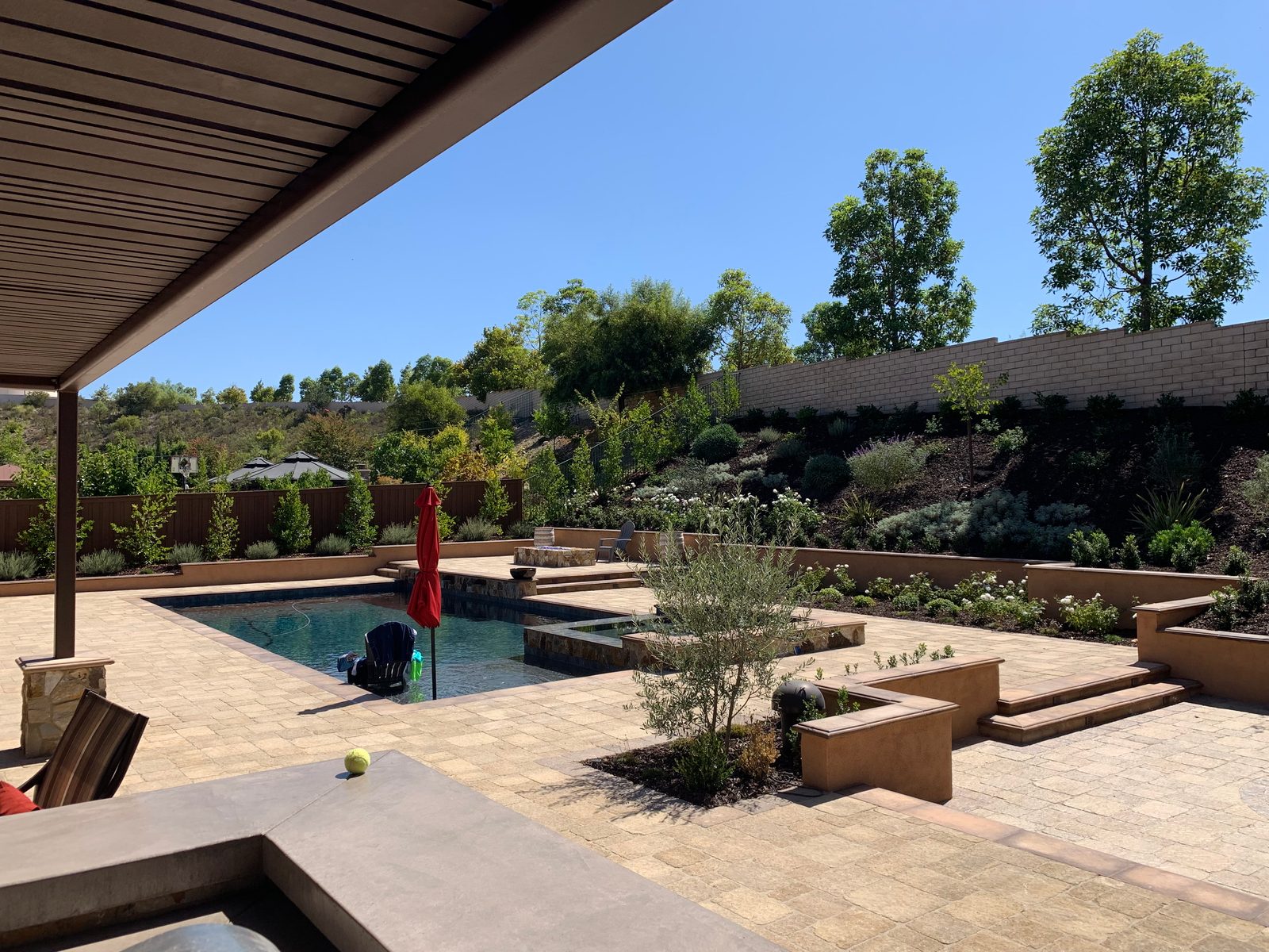StoneBridge Scripps Ranch. Fire pit and natural stone seating area