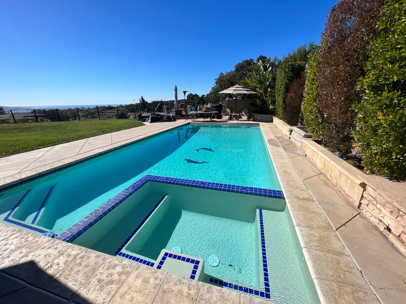 Custom pool and spa with a hilltop view in La Jolla by Panjia Outdoors